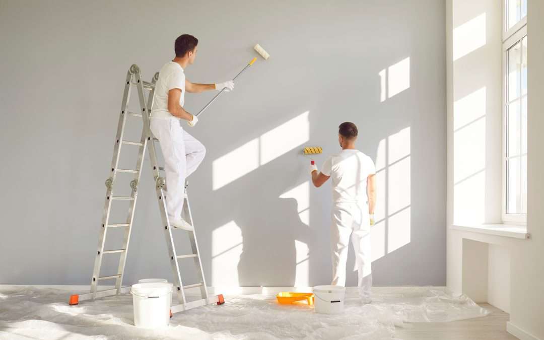 An insured painting company painting a new home's interior.